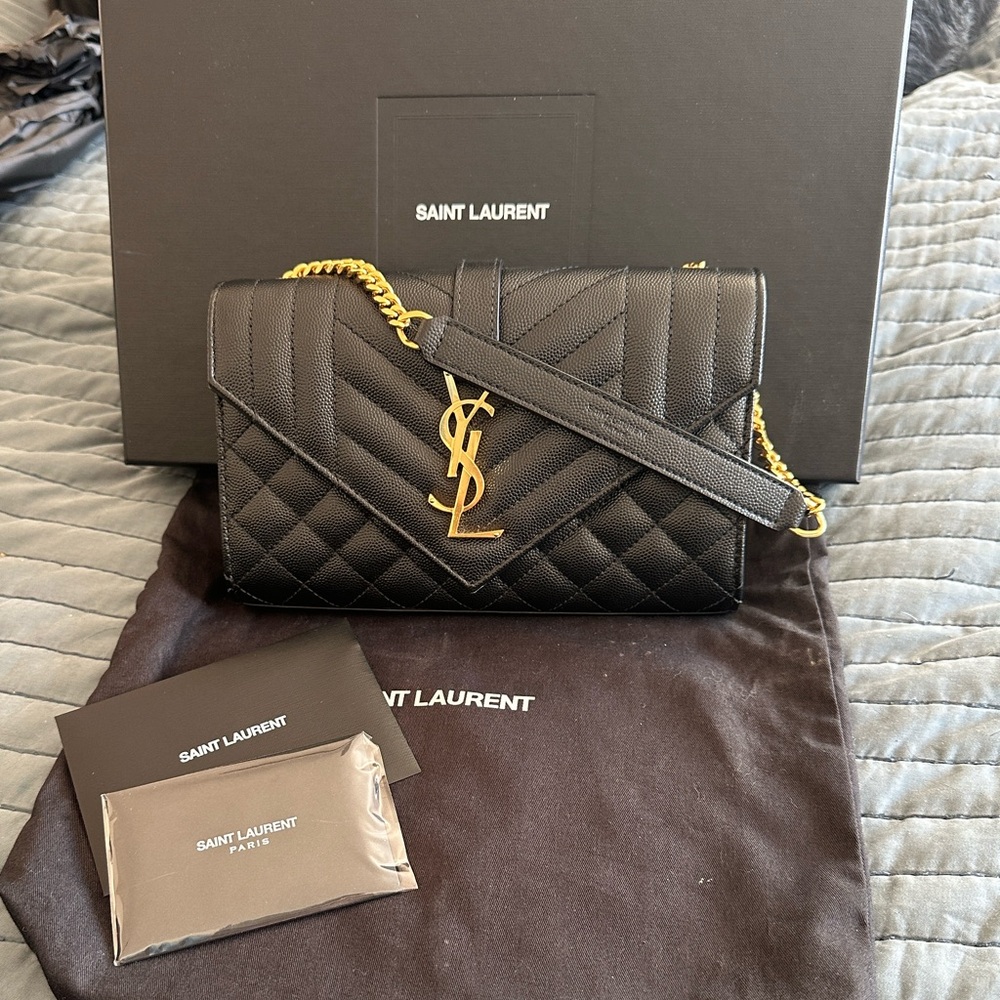 Saint Laurent Black Quilted Clutch with Gold Logo